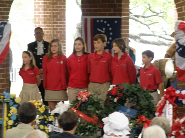 Ceremony St. Simons Christian Students Poem.JPG